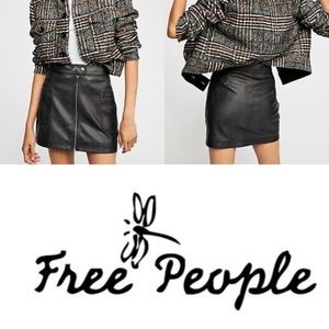 Free People black vegan leather zip two pockets in the front mini skirt size 2